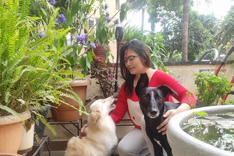 Nongmaithem Rita with pets and plants in her garaden